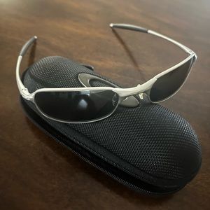 Oakley metal frame sunglasses polarized